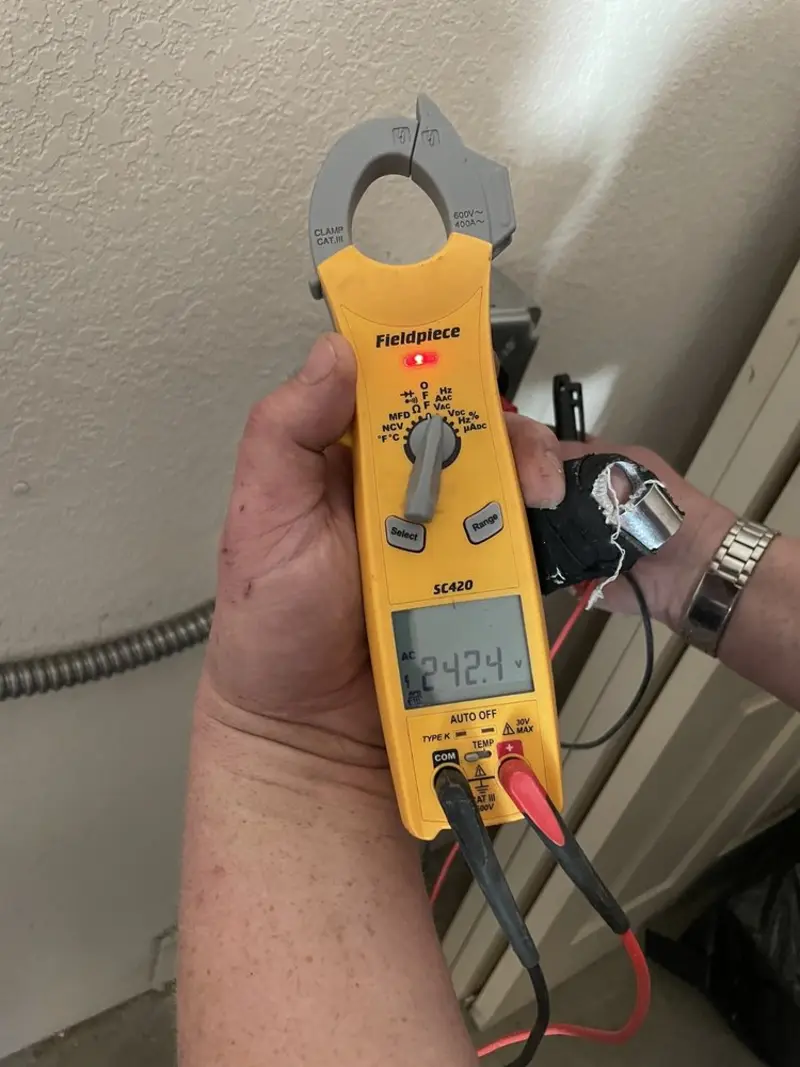 Voltage testing with clamp meter during Whole House Surge Protector in Boonton